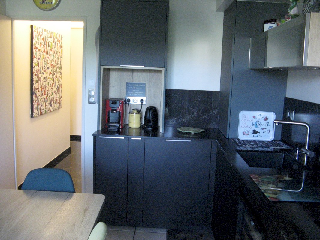 T4 de 95 m² - Photo 3 - Aurillac